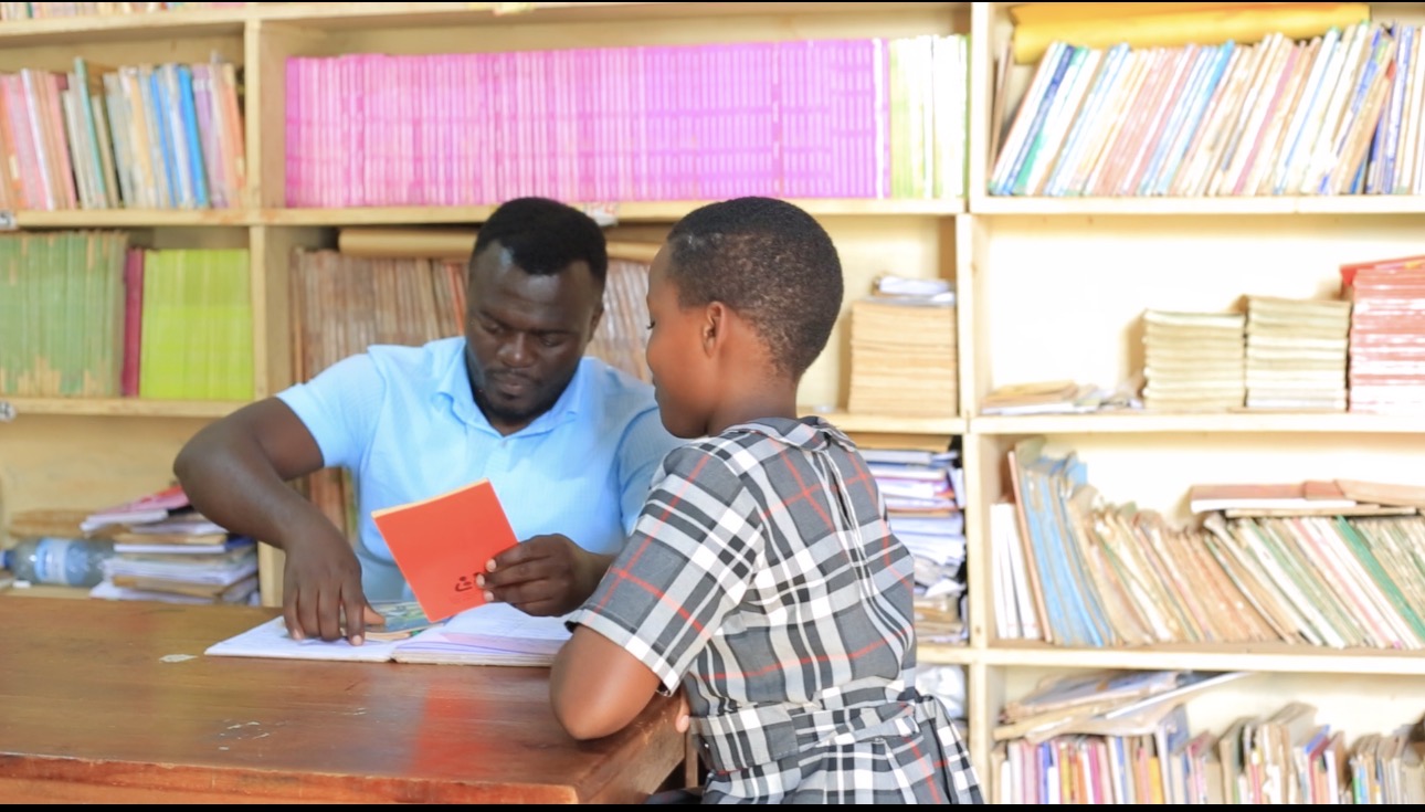 Teachers attending to pupils on topics they need more light on the books found in the school library 1